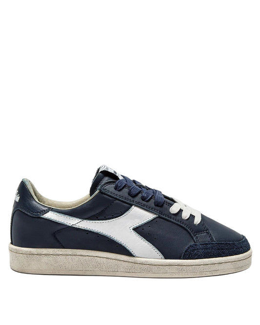 Navy and white sneaker on a white background