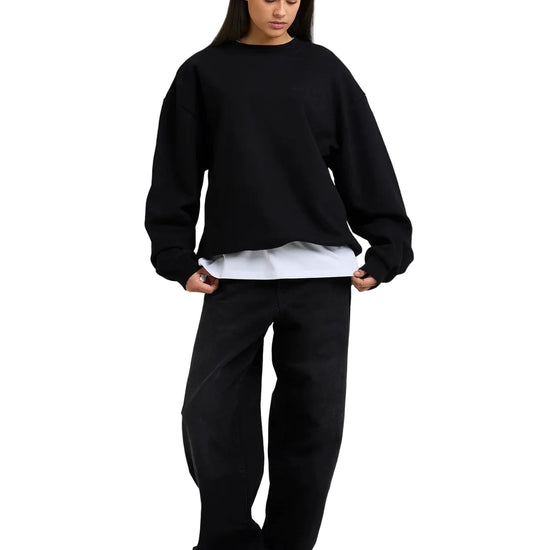 Ton-sur-ton Arbor Icon detail op zwarte Arbor Antwerp sweater