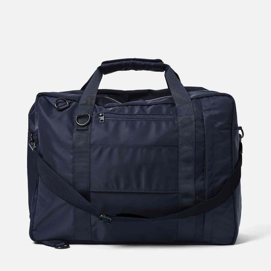 AY Studios Weekend Bag Navy Blue reistas, van achteren met aangehaakte schouderband