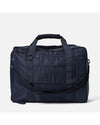 AY Studios Weekend Bag Navy Blue reistas, van achteren met aangehaakte schouderband