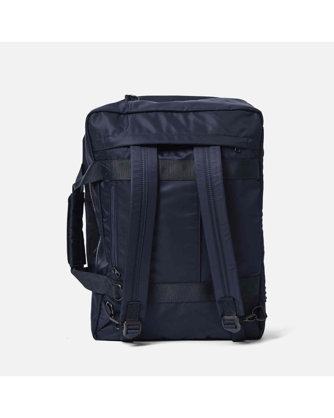 AY Studios Weekend Bag Navy Blue reistas, rechtop, met de rugzakriemen zichtbaar