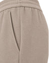 Genti Alex broek Soft Taupe – detail van de elastische tailleband, steekzak en stof | Checkpoint Mol