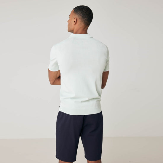 Genti mintgroene Cooldry polo, gedragen achteraanzicht