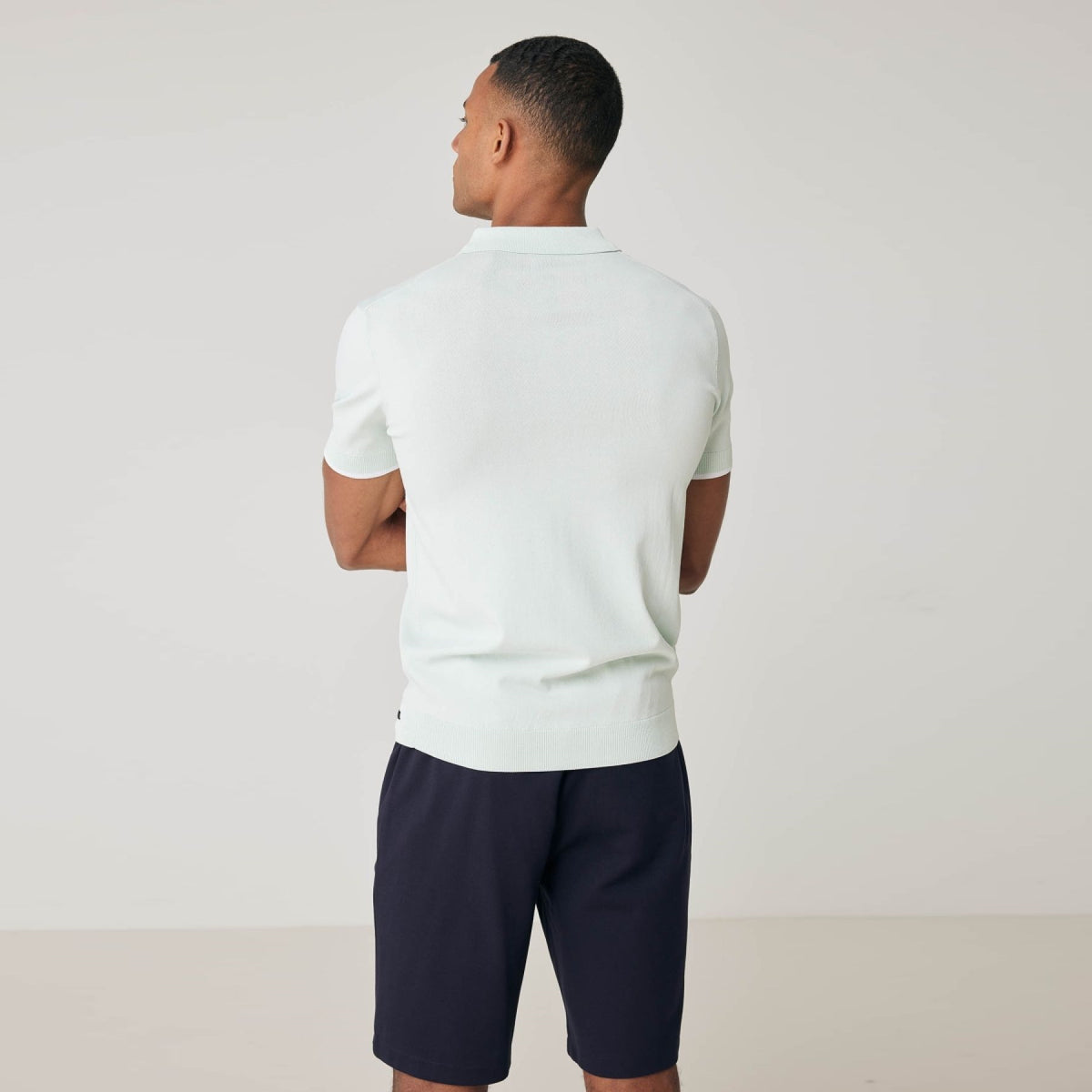 Genti mintgroene Cooldry polo, gedragen achteraanzicht
