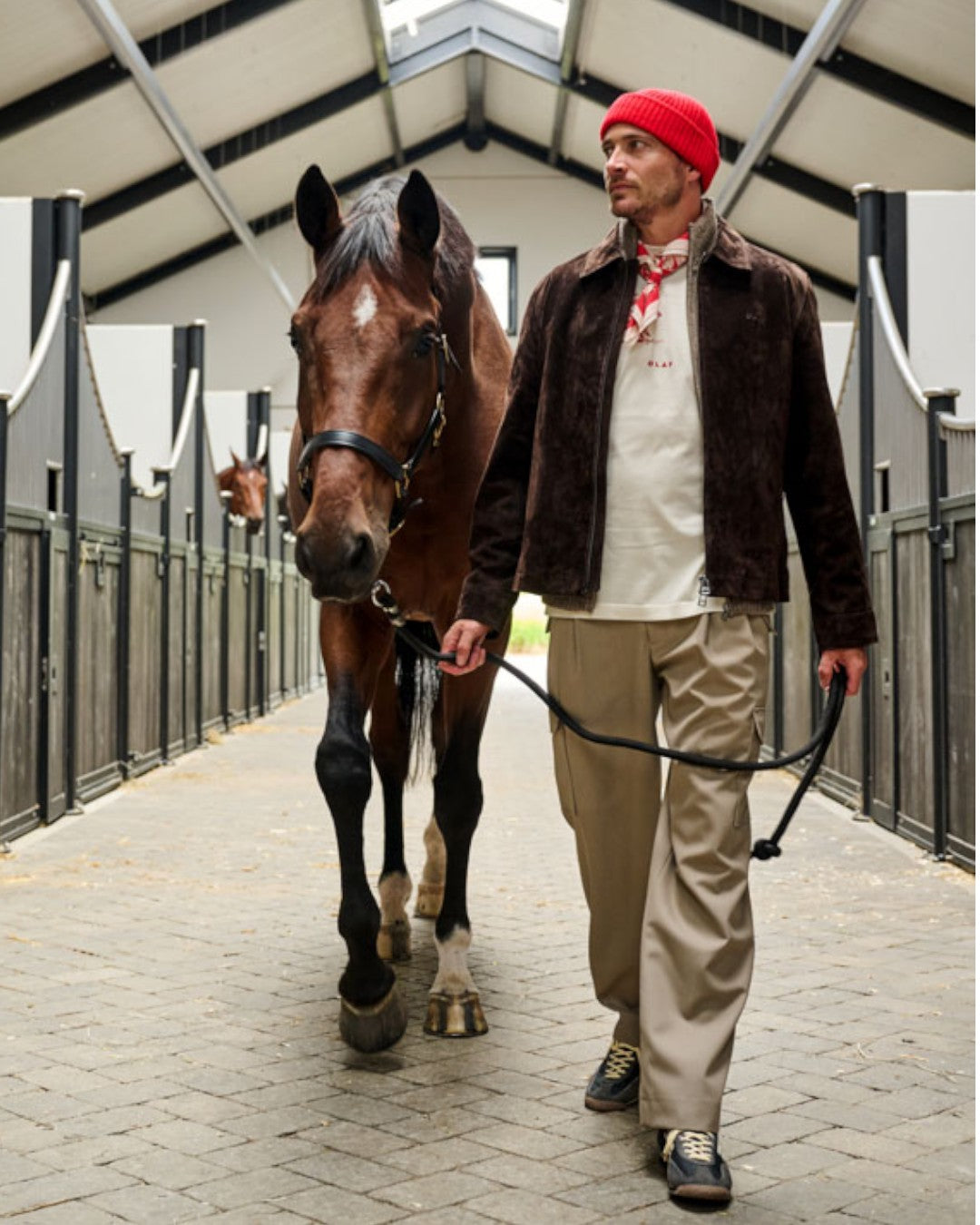 OLAF Hussein suède jasje en gebreide mockneck in The Hidden Estate FW26