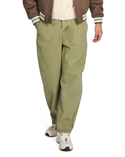 PAL Sporting Goods Gallop Barrel Leg broek in Green, gedragen vooraanzicht met wijde pijpen en bruine Ranch Varsity Jacket.