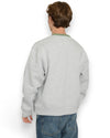 PAL Sporting Goods Pre Game Crewneck in Light Grey Marl, gedragen achteraanzicht met groene halsboord.
