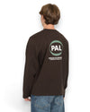 PAL Sporting Goods Pre Game Longsleeve in Deep Mahogany, gedragen achteraanzicht met PAL-logo op de rug.