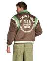 PAL Sporting Goods Ranch Varsity Jacket in Deep Mahogany, gedragen achteraanzicht met rugborduring en groene Gallop Barrel Leg broek.