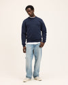 The GoodPeople Lommy donkerblauwe sweater, gedragen in een volledige combinatie