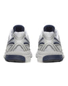 Achterkant van Saucony ProGrid Guide 7 Oyster Navy met technische running details