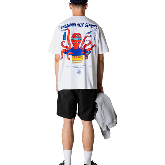 Achterkant van de Woodbird WBBaine Octo Tee White met octopus-chef rugprint